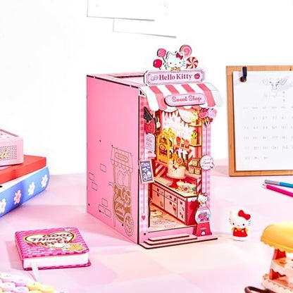 Hands Craft Hello Kitty Sweet Shop Book Nook Kit – Official Sanrio DIY Miniature Shelf Insert with Touch LED – 149-Piece 3D Puzzle for Adults & Teens – Kawaii Decor, Collectible Diorama Craft Kit - Image 4
