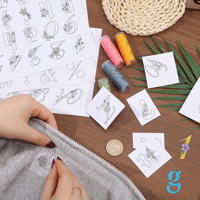 ORIGACH 4 Sheets 143 Pcs Water Soluble Embroidery Patterns Stabilizers - Pre-Printed Letter, Number & Floral Hand Sewing Stabilizers- Stick & Stitch Embroidery Patterns for Hand Sewing Beginner